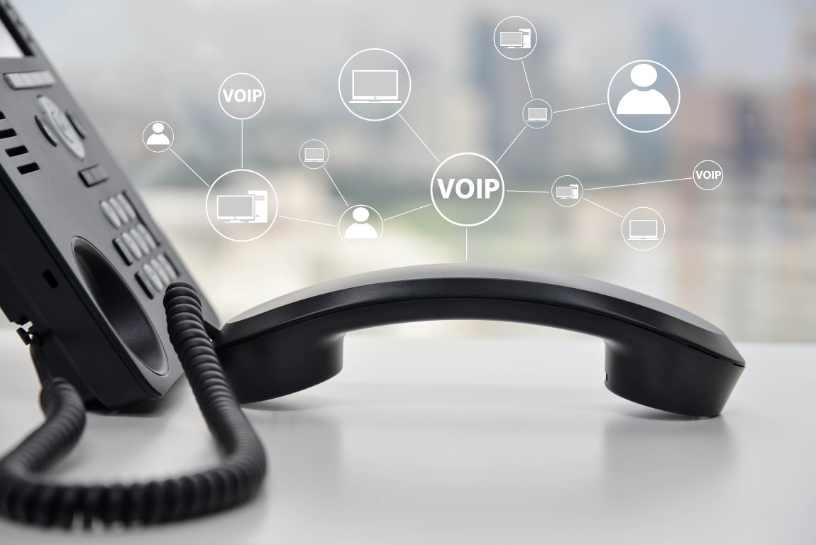 An image of an VOIP phone with icons that represent VOIP phone services | IT Services in Falkirk